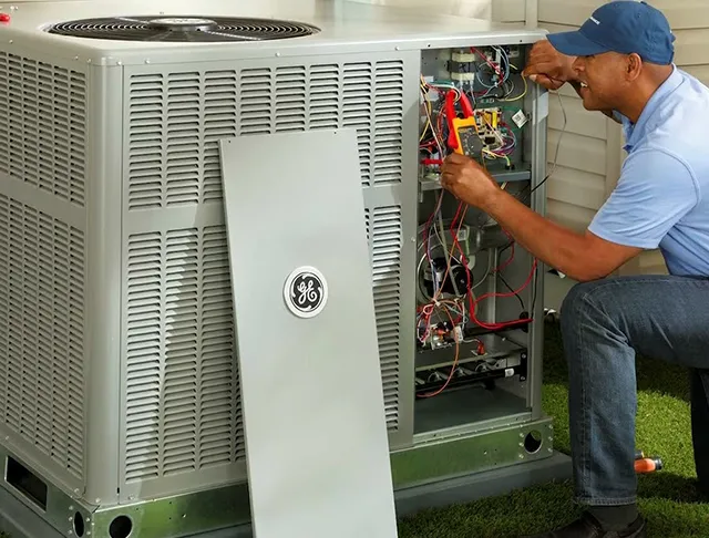 HVAC technician installing residential HVAC system.